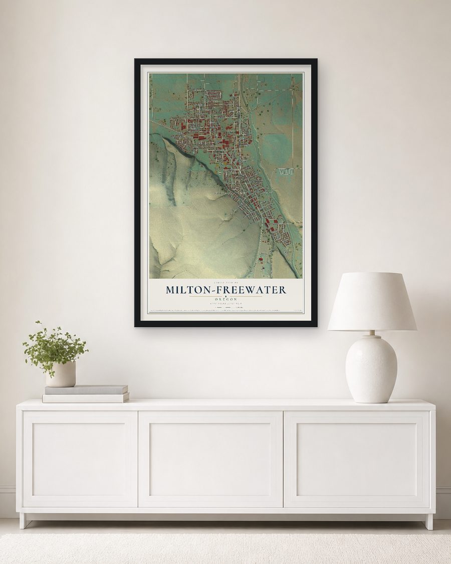 The Milton-Freewater, Oregon map, 24 x 36 in, in a black wood frame on a living room wall