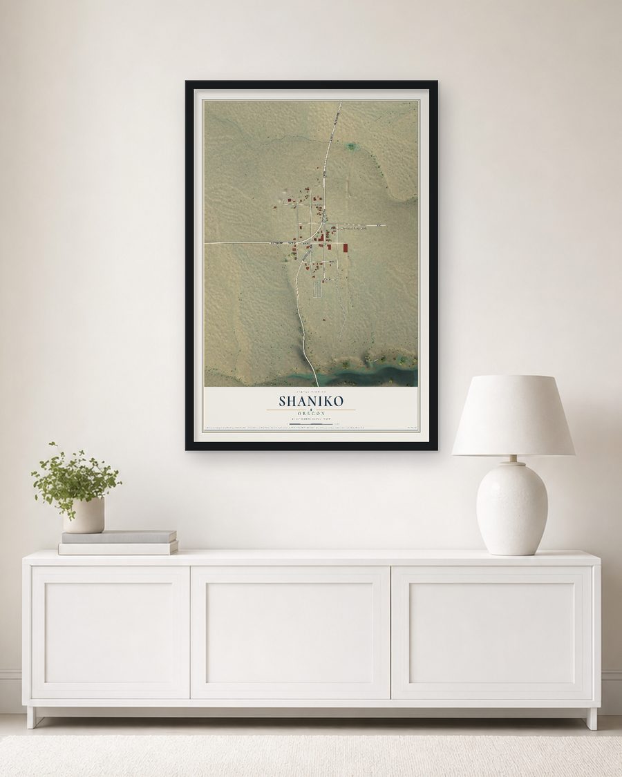 The Shaniko, Oregon map, 24 x 36 in, in a black wood frame on a living room wall