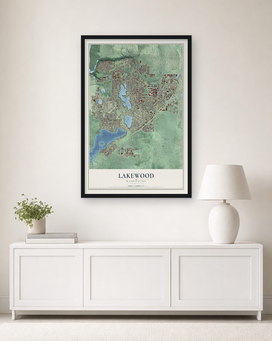 The Lakewood, Washington map, 24 x 36 in, in a black wood frame on a living room wall
