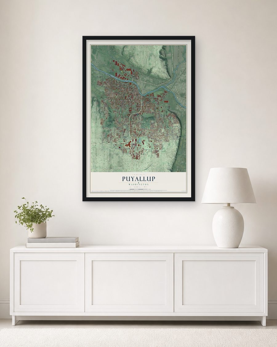 The Puyallup, Washington map, 24 x 36 in, in a black wood frame on a living room wall