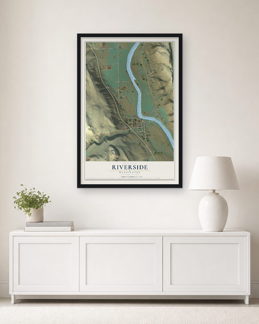The Riverside, Washington map, 24 x 36 in, in a black wood frame on a living room wall