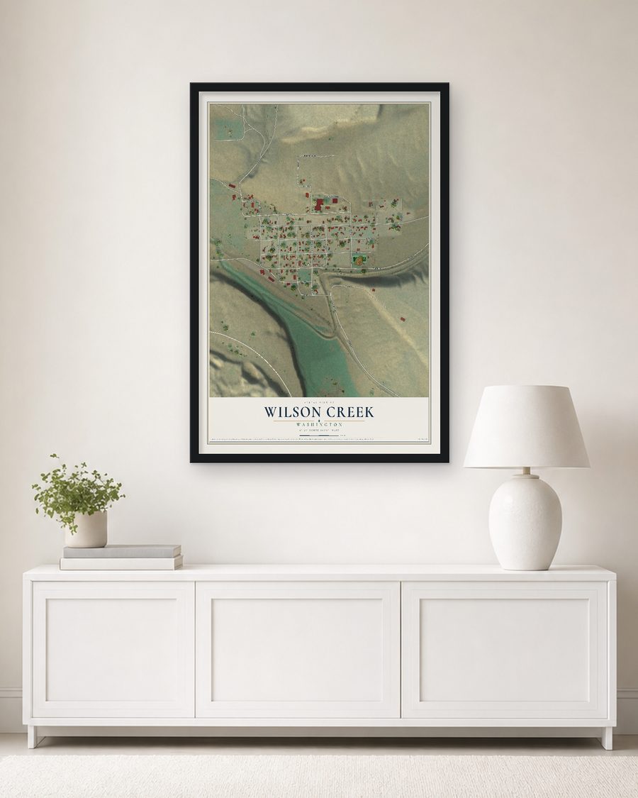 The Wilson Creek, Washington map, 24 x 36 in, in a black wood frame on a living room wall
