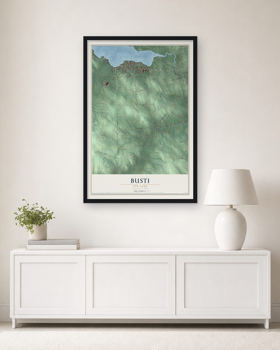 The Busti, New York map, 24 x 36 in, in a black wood frame on a living room wall