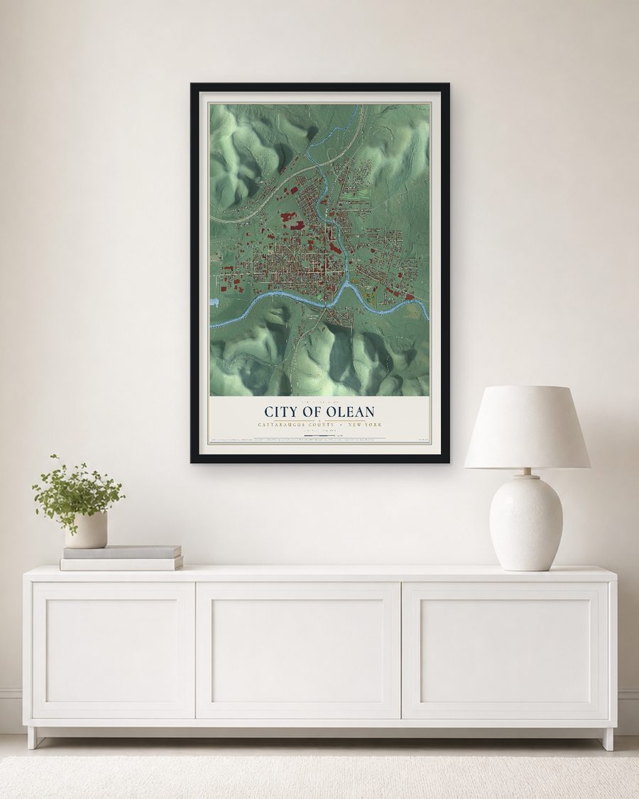 The City of Olean, Cattaraugus County, New York map, 24 x 36 in, in a black wood frame on a living room wall