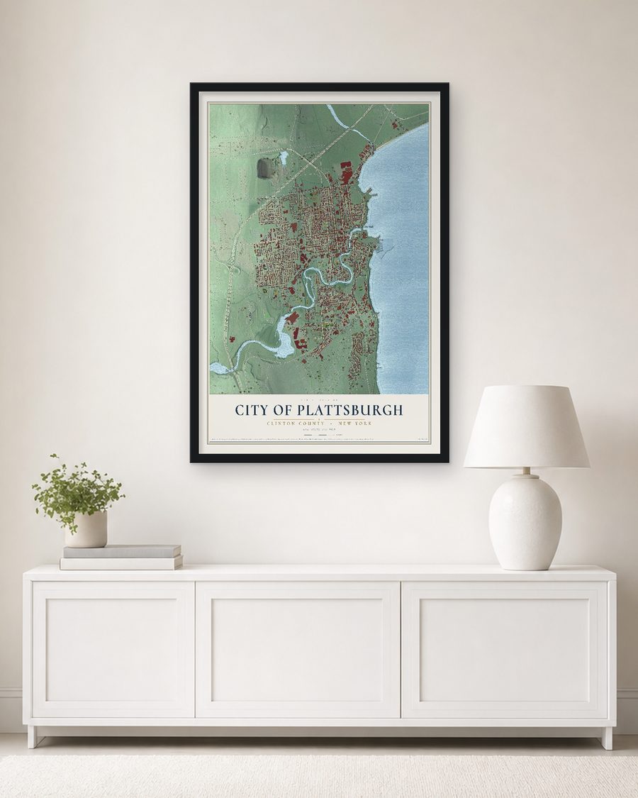 The City of Plattsburgh, Clinton County, New York map, 24 x 36 in, in a black wood frame on a living room wall