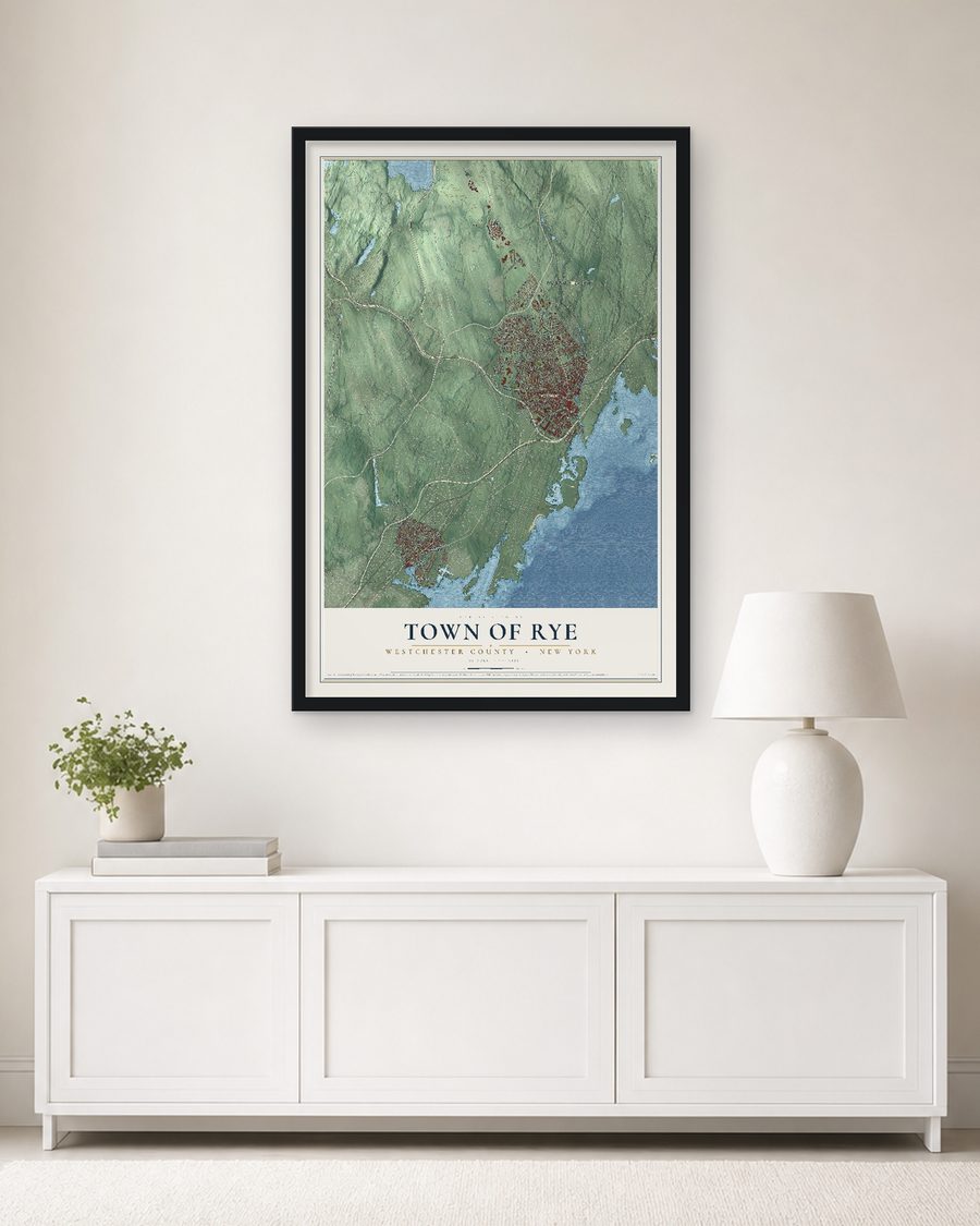 The Town of Rye, Westchester County, New York map, 24 x 36 in, in a black wood frame on a living room wall
