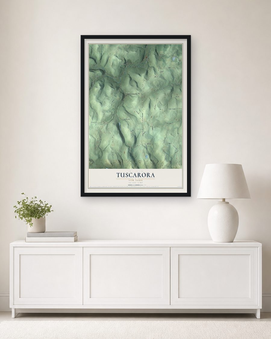 The Tuscarora, New York map, 24 x 36 in, in a black wood frame on a living room wall