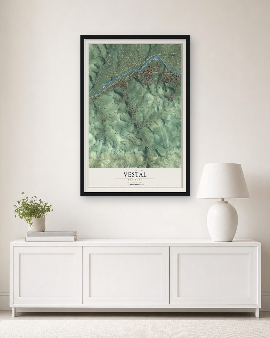 The Vestal, New York map, 24 x 36 in, in a black wood frame on a living room wall