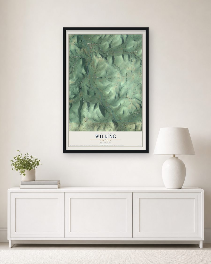 The Willing, New York map, 24 x 36 in, in a black wood frame on a living room wall