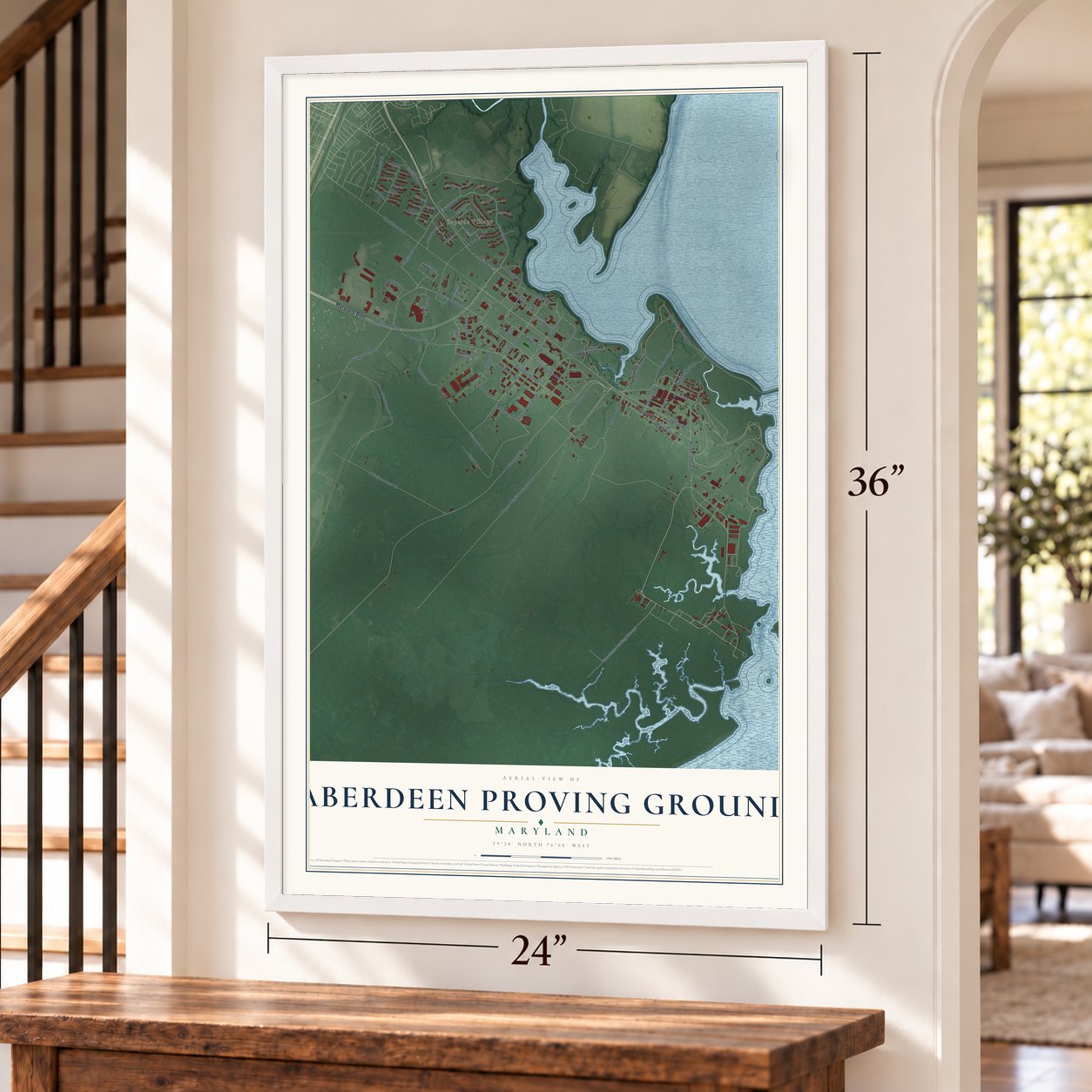Aberdeen Proving Ground, Maryland map, 24 x 36 inch print in a white frame by a staircase