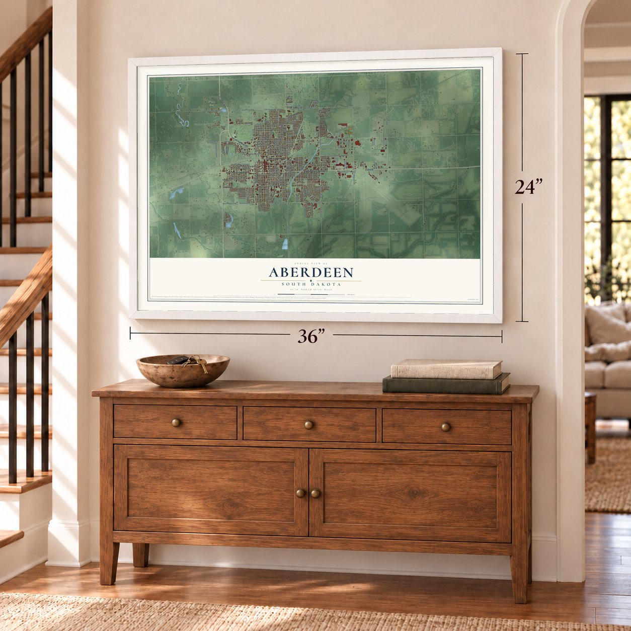 Aberdeen, South Dakota map, 24 x 36 inch print in a white frame above a dresser by a staircase