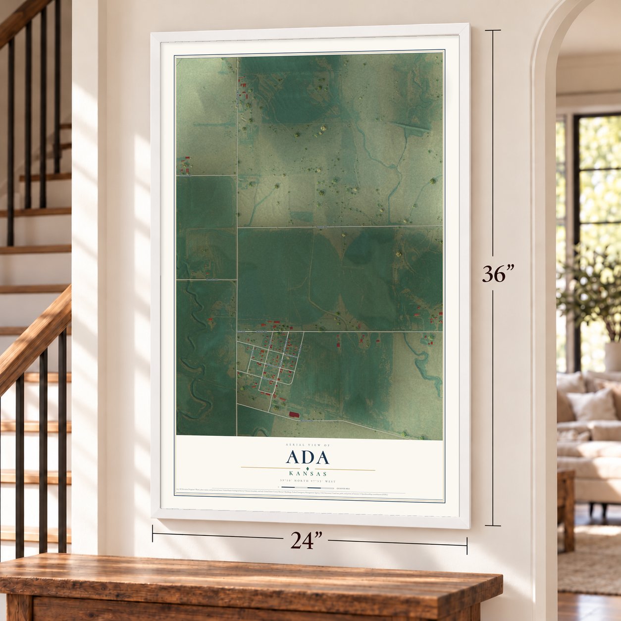 Ada, Kansas map, 24 x 36 inch print in a white frame by a staircase