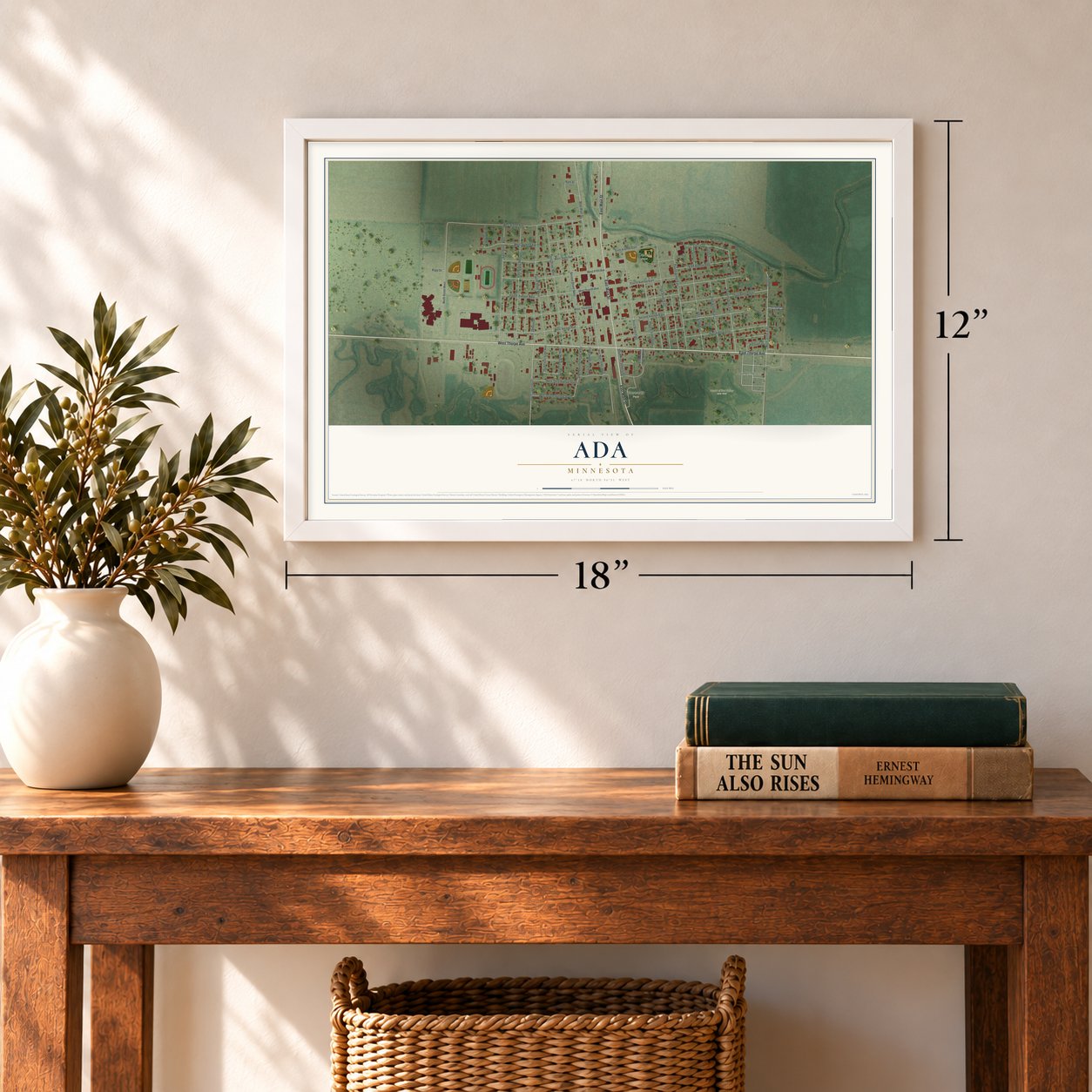 Ada, Minnesota map, 12 x 18 inch print in a white frame in an entryway