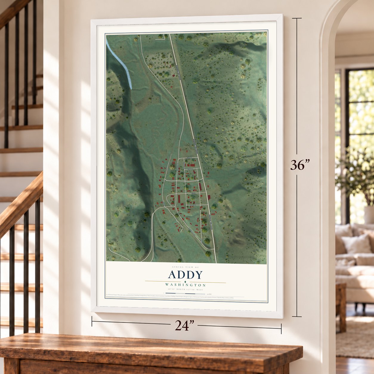 Addy, Washington map, 24 x 36 inch print in a white frame by a staircase