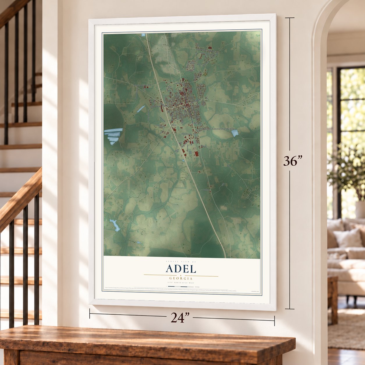 Adel, Georgia map, 24 x 36 inch print in a white frame by a staircase