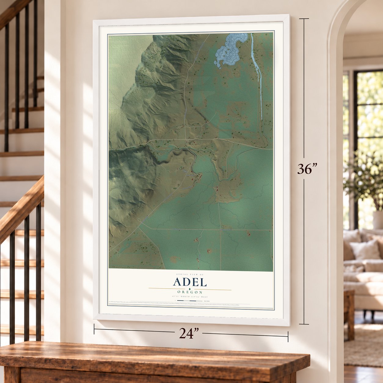 Adel, Oregon map, 24 x 36 inch print in a white frame by a staircase