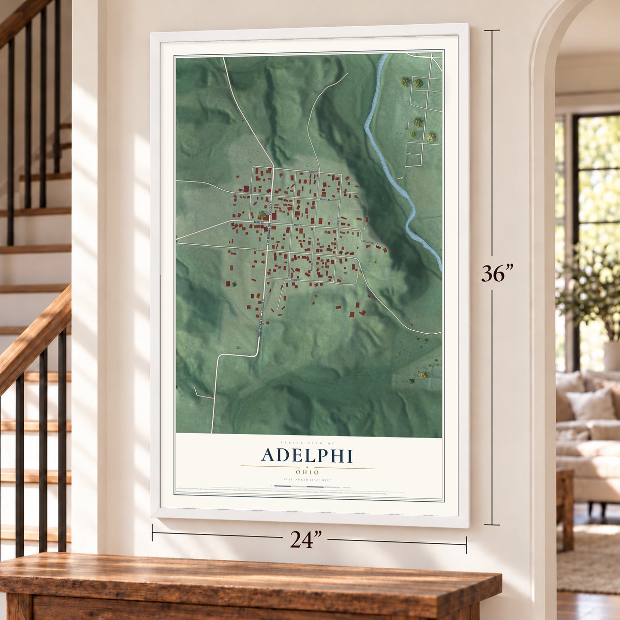 Adelphi, Ohio map, 24 x 36 inch print in a white frame by a staircase