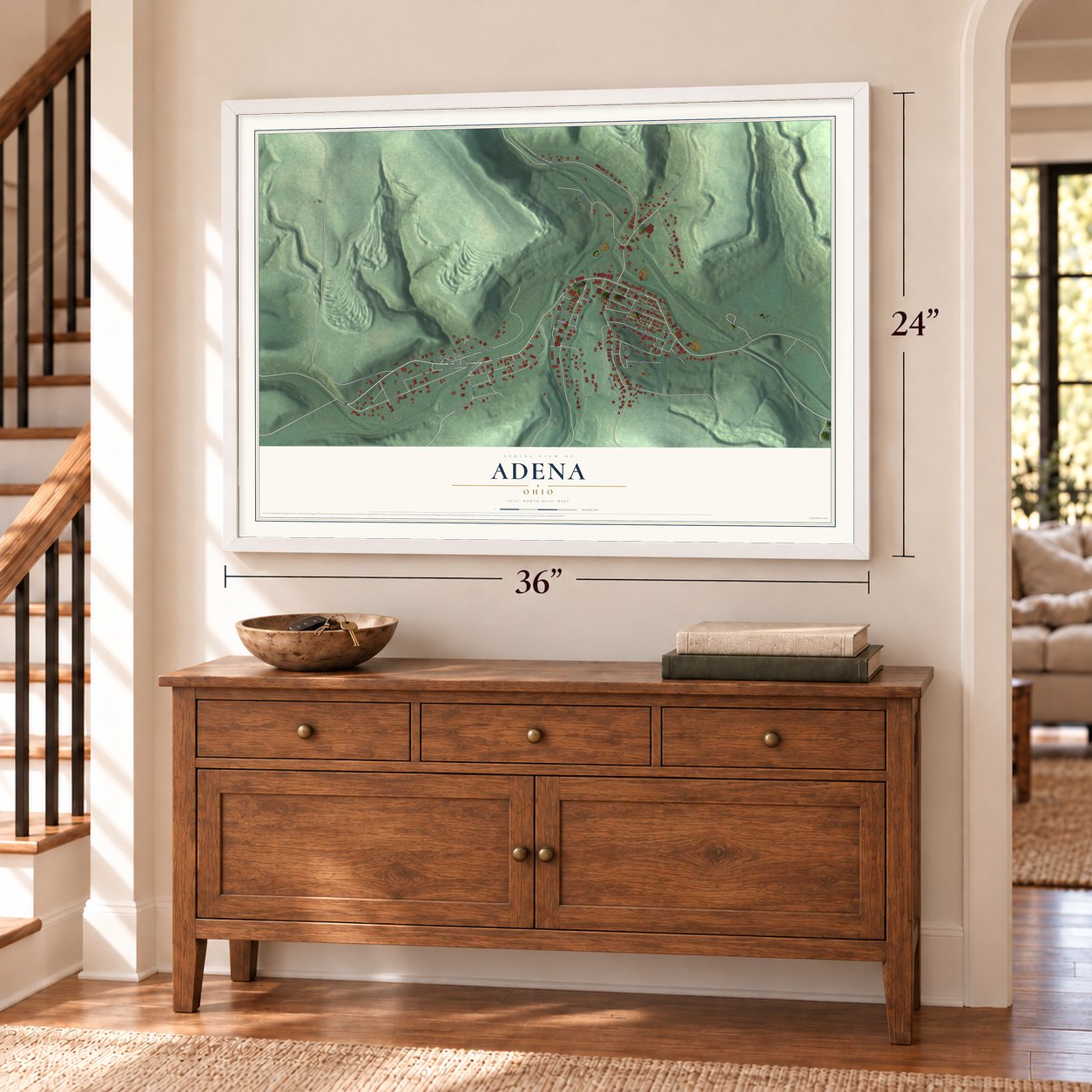Adena, Ohio map, 24 x 36 inch print in a white frame above a dresser by a staircase