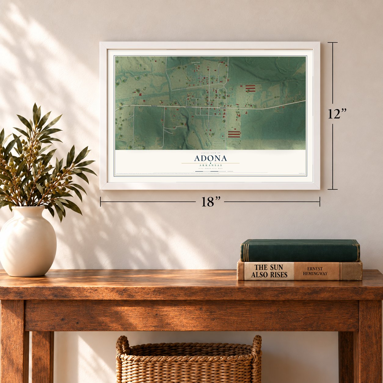 Adona, Arkansas map, 12 x 18 inch print in a white frame in an entryway