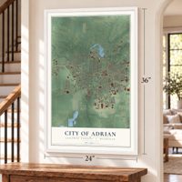 Adrian, Michigan map, 24 x 36 inch print in a white frame by a staircase