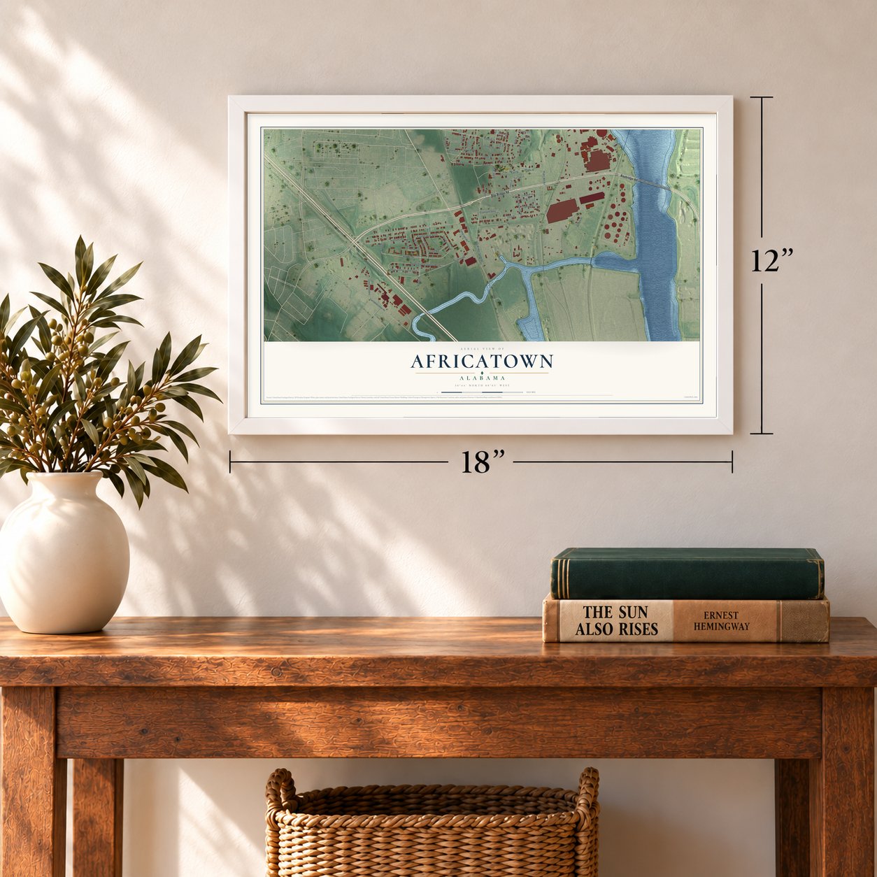 Africatown, Alabama map, 12 x 18 inch print in a white frame in an entryway