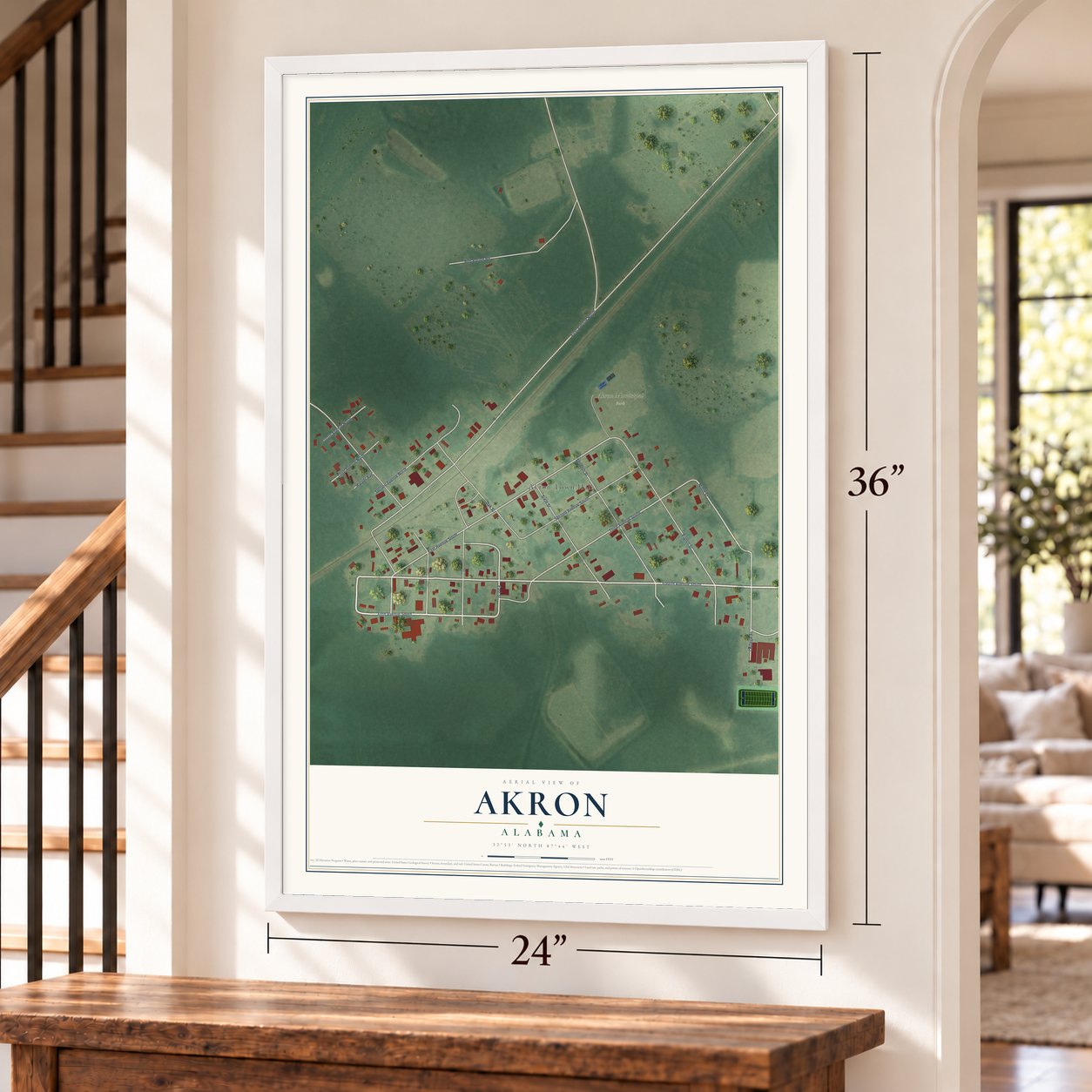 Akron, Alabama map, 24 x 36 inch print in a white frame by a staircase