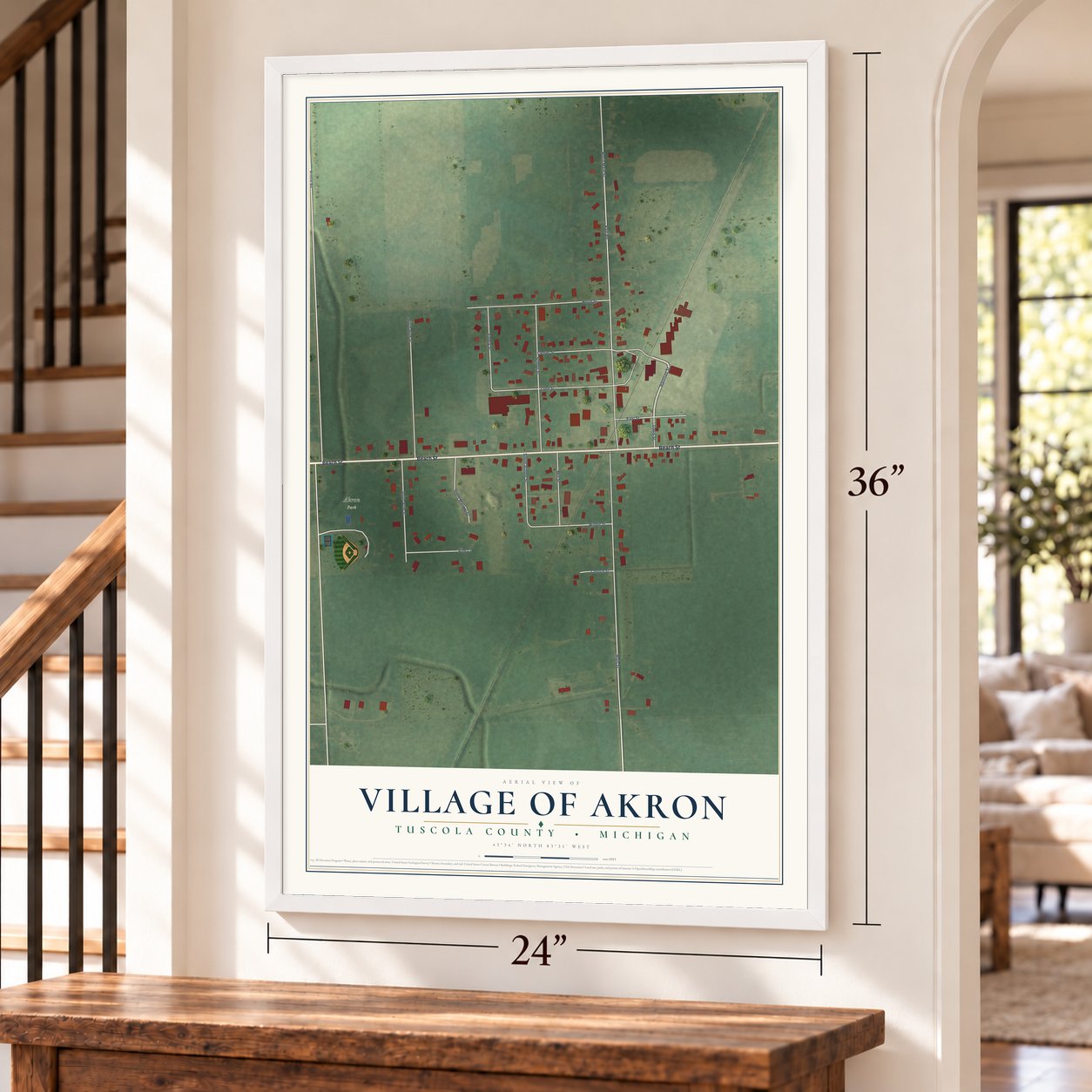 Akron, Michigan map, 24 x 36 inch print in a white frame by a staircase