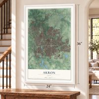 Akron, Ohio map, 24 x 36 inch print in a white frame by a staircase