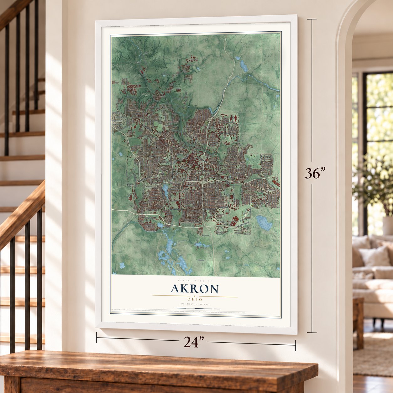 Akron, Ohio map, 24 x 36 inch print in a white frame by a staircase