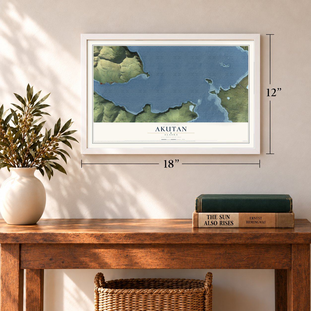 Akutan, Alaska map, 12 x 18 inch print in a white frame in an entryway