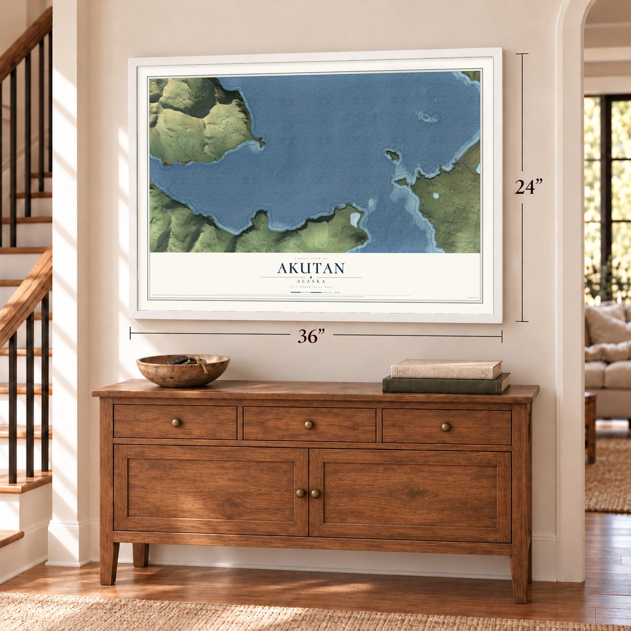Akutan, Alaska map, 24 x 36 inch print in a white frame above a dresser by a staircase