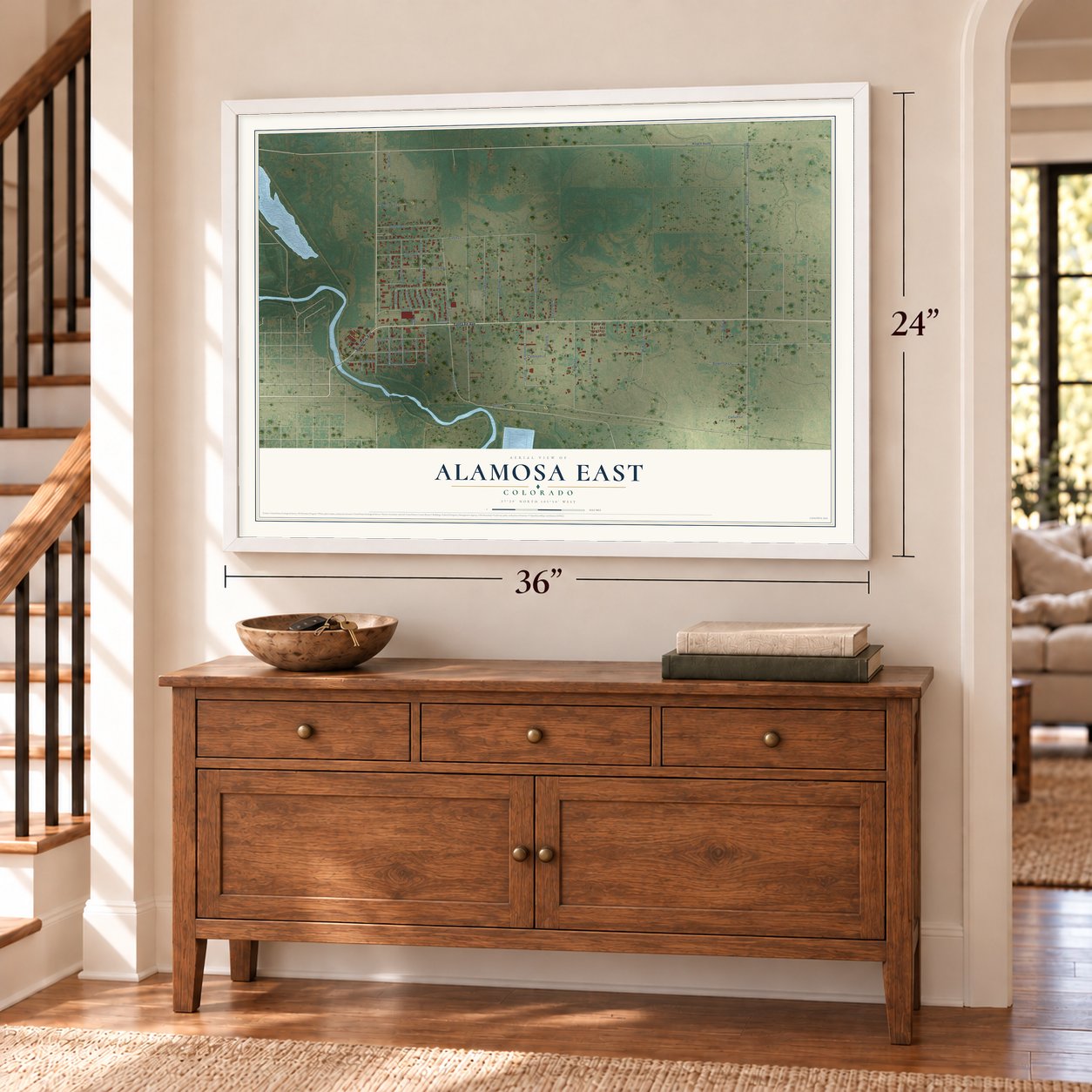 Alamosa East, Colorado map, 24 x 36 inch print in a white frame above a dresser by a staircase