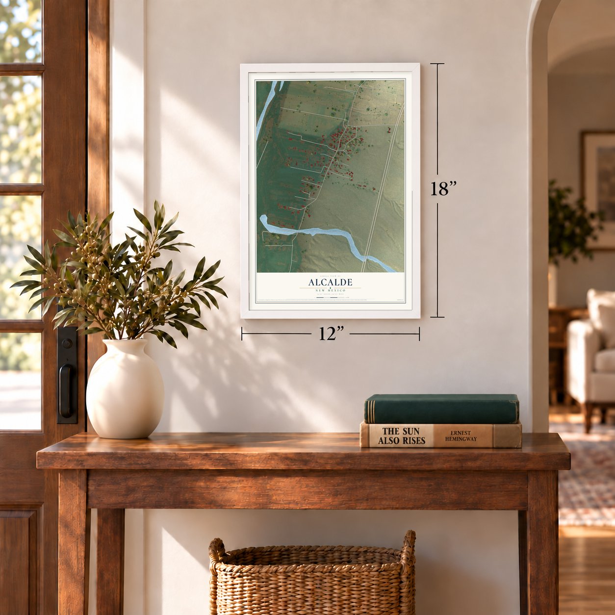 Alcalde, New Mexico map, 12 x 18 inch print in a white frame in an entryway