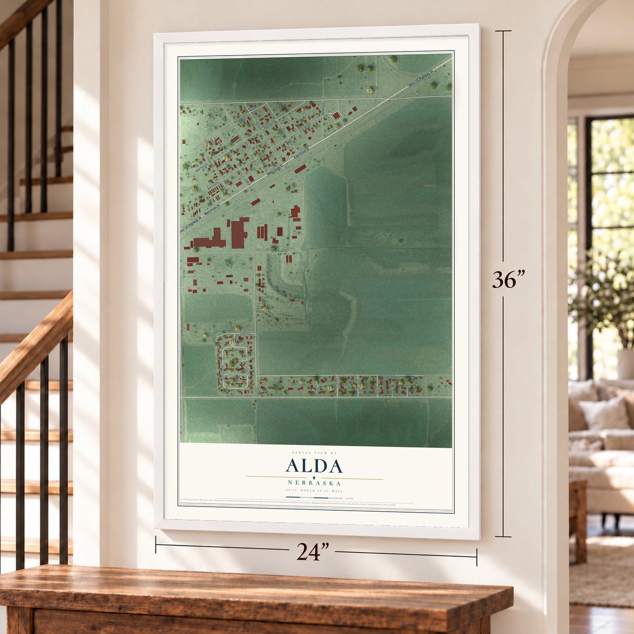Alda, Nebraska map, 24 x 36 inch print in a white frame by a staircase