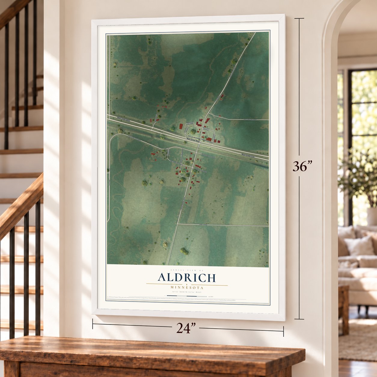 Aldrich, Minnesota map, 24 x 36 inch print in a white frame by a staircase