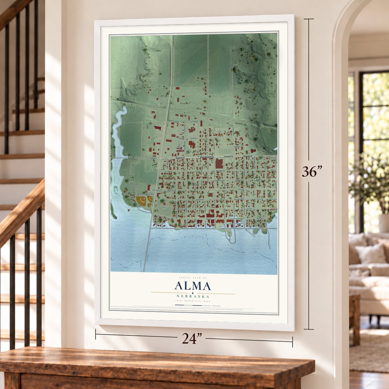 Alma, Nebraska map, 24 x 36 inch print in a white frame by a staircase