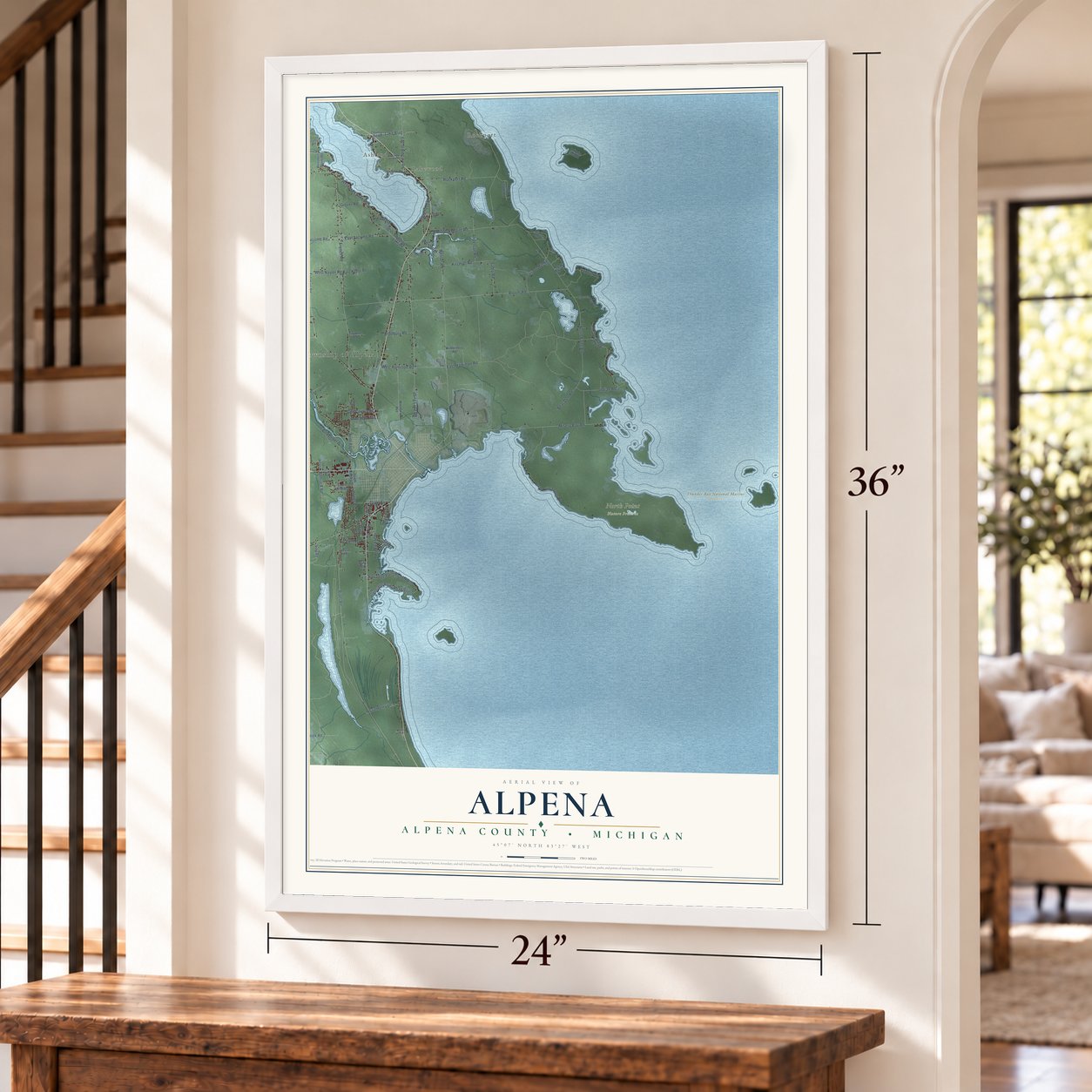 Alpena, Alpena County, Michigan map, 24 x 36 inch print in a white frame by a staircase