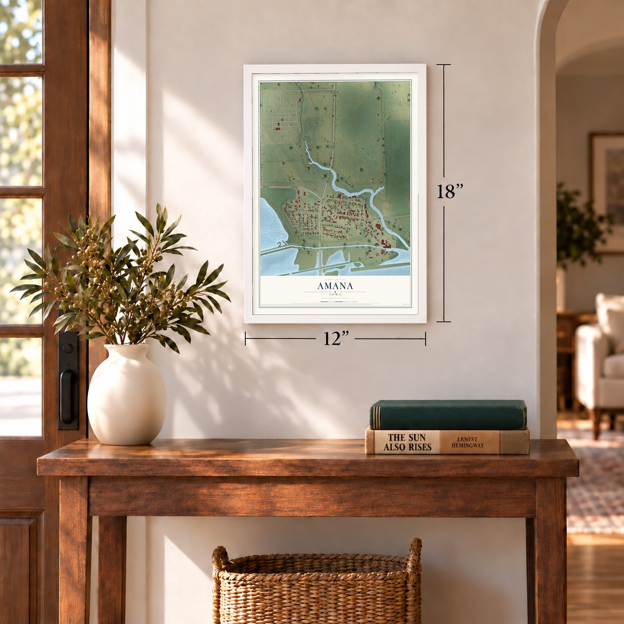 Amana, Iowa map, 12 x 18 inch print in a white frame in an entryway
