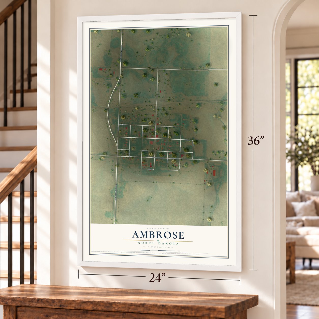Ambrose, North Dakota map, 24 x 36 inch print in a white frame by a staircase