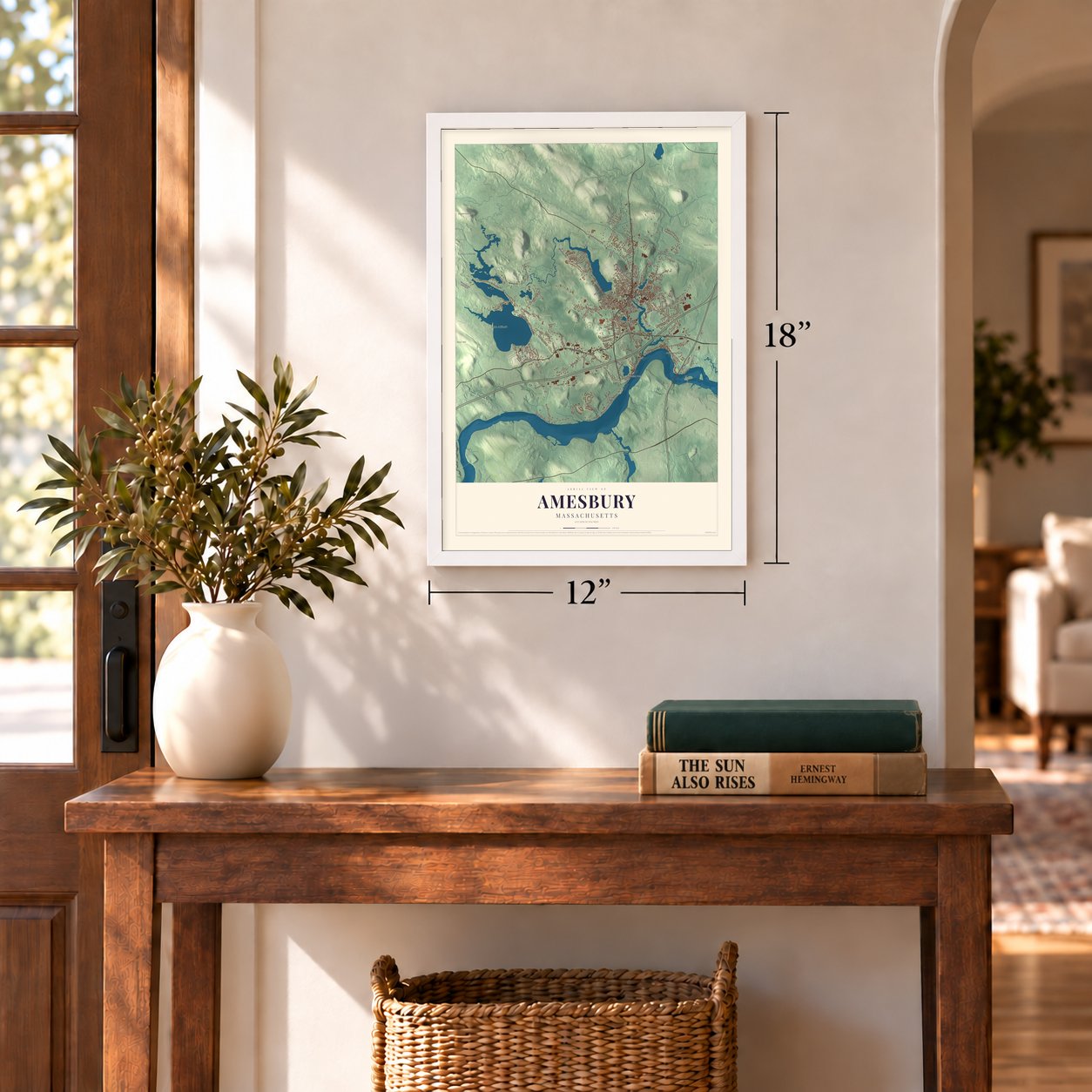 Amesbury, Massachusetts map, 12 x 18 inch print in a white frame in an entryway