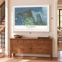 Anacortes, Washington map, 24 x 36 inch print in a white frame above a dresser by a staircase