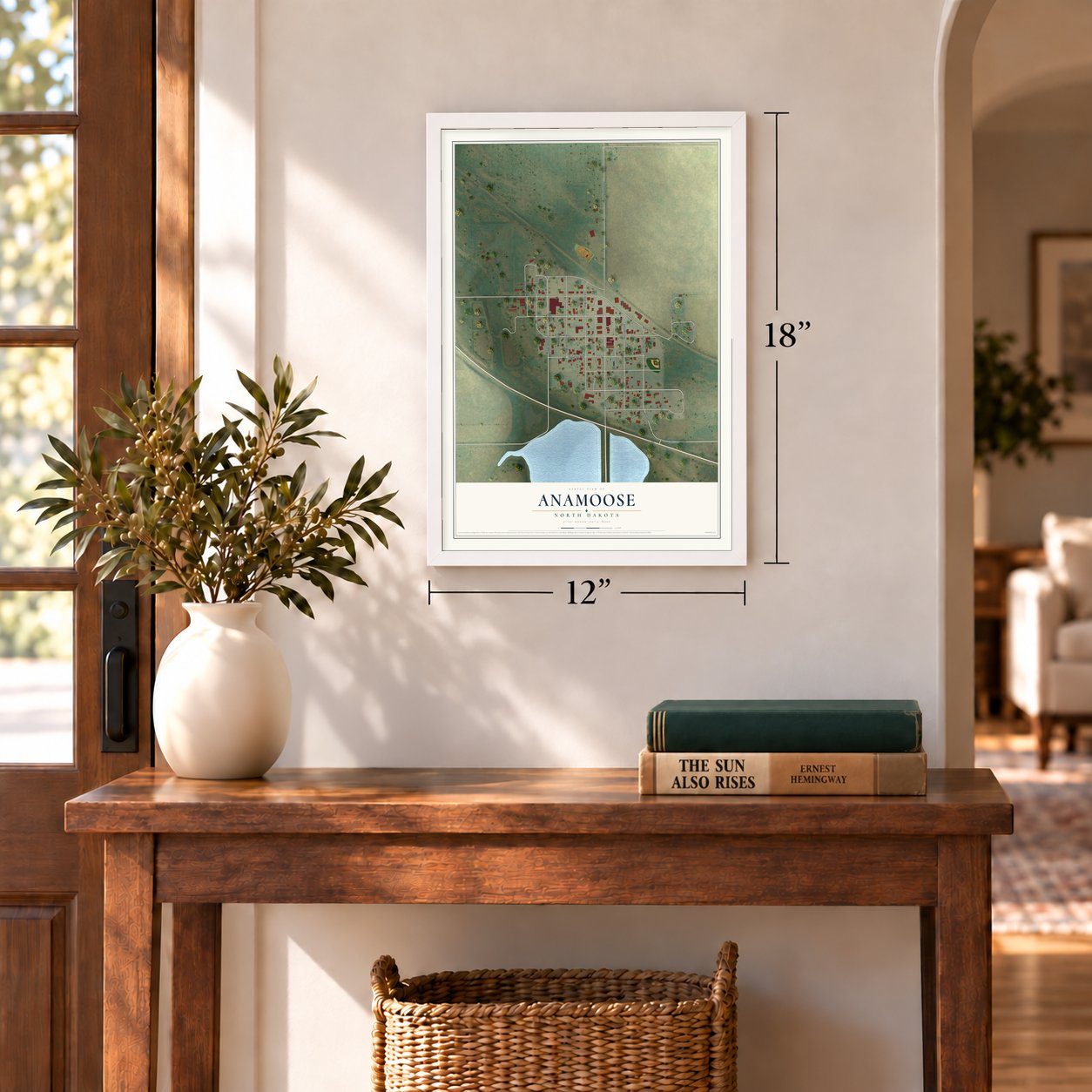 Anamoose, North Dakota map, 12 x 18 inch print in a white frame in an entryway