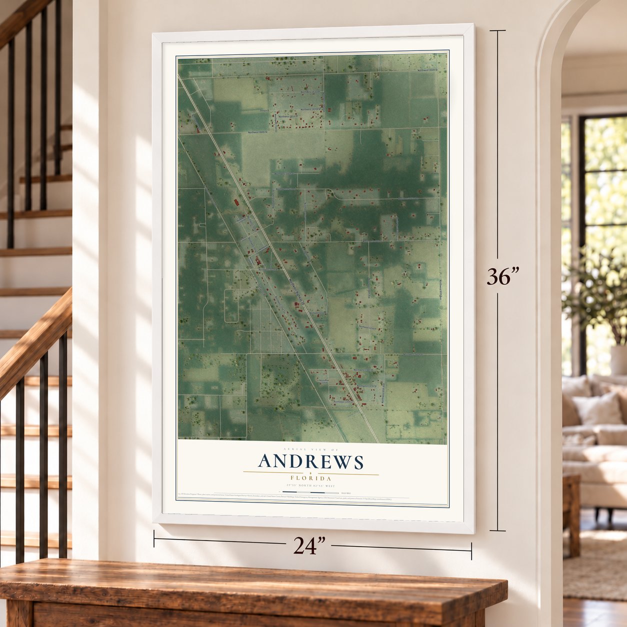 Andrews, Florida map, 24 x 36 inch print in a white frame by a staircase