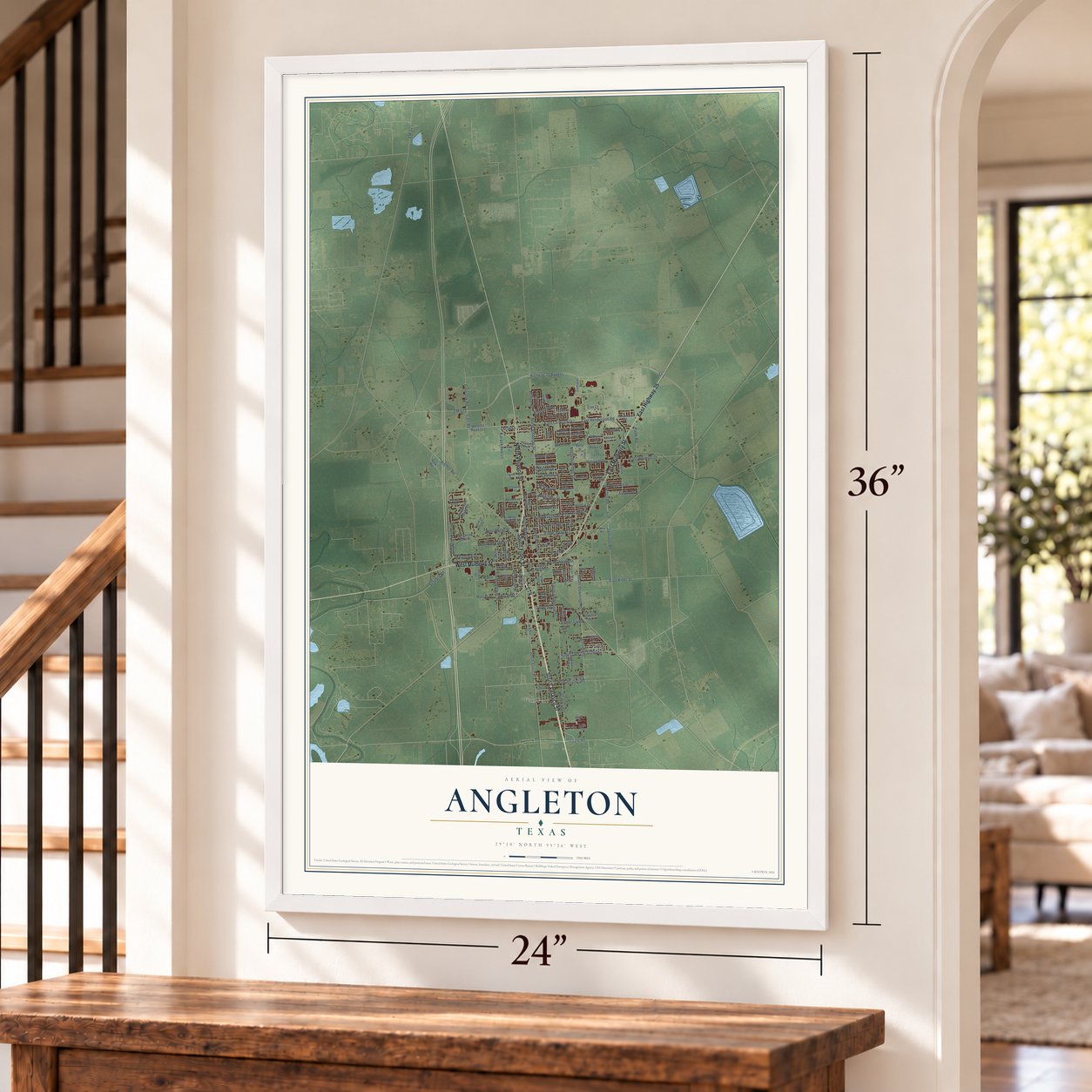 Angleton, Texas map, 24 x 36 inch print in a white frame by a staircase