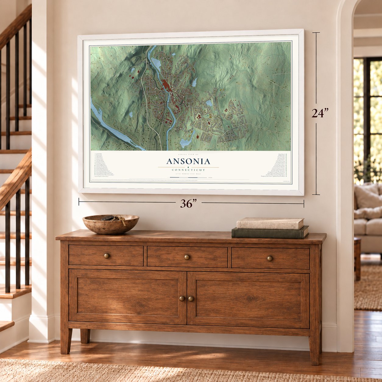 Ansonia, Connecticut map, 24 x 36 inch print in a white frame above a dresser by a staircase