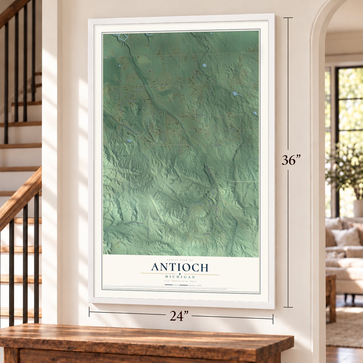 Antioch, Michigan map, 24 x 36 inch print in a white frame by a staircase