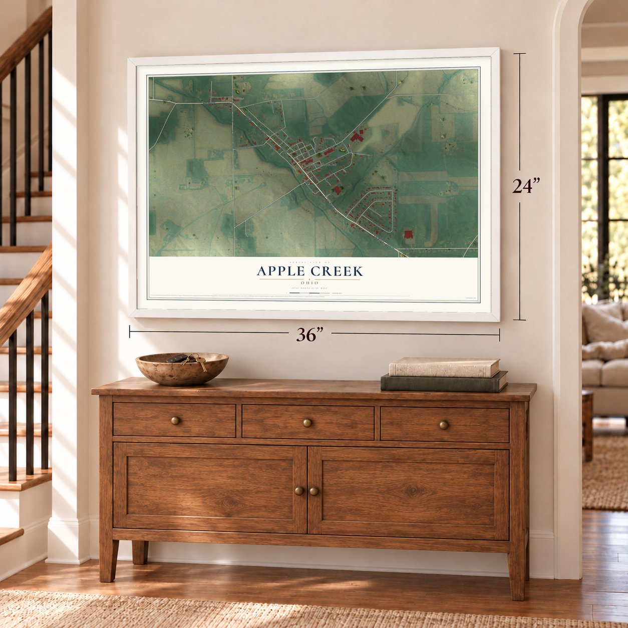 Apple Creek, Ohio map, 24 x 36 inch print in a white frame above a dresser by a staircase