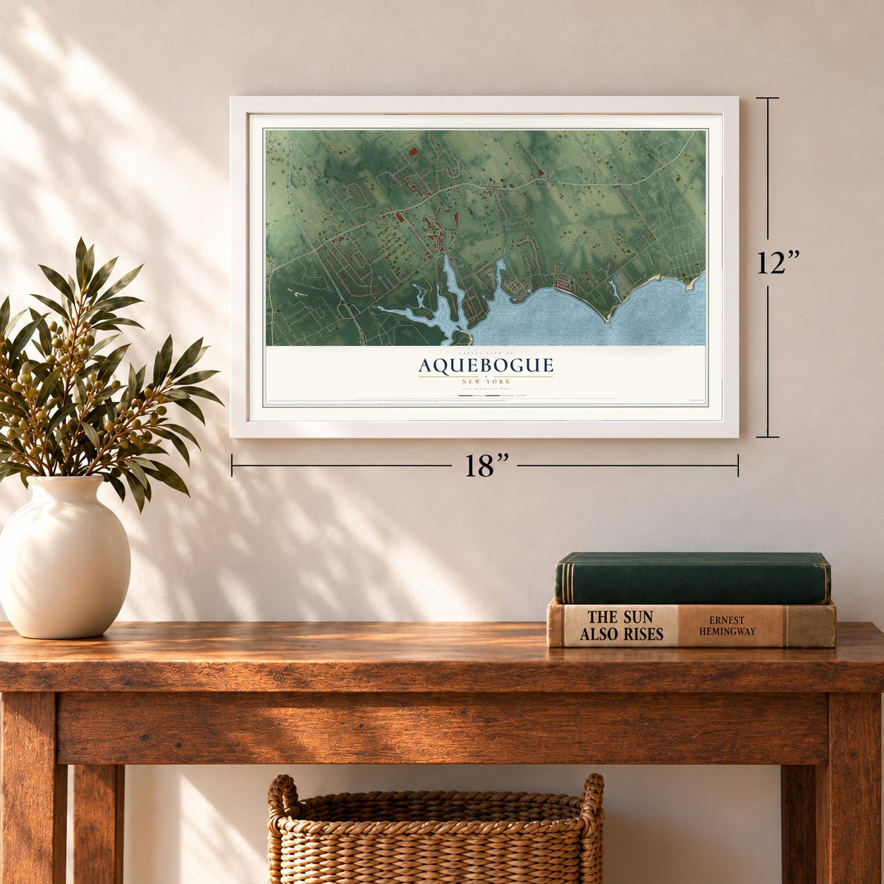 Aquebogue, New York map, 12 x 18 inch print in a white frame in an entryway