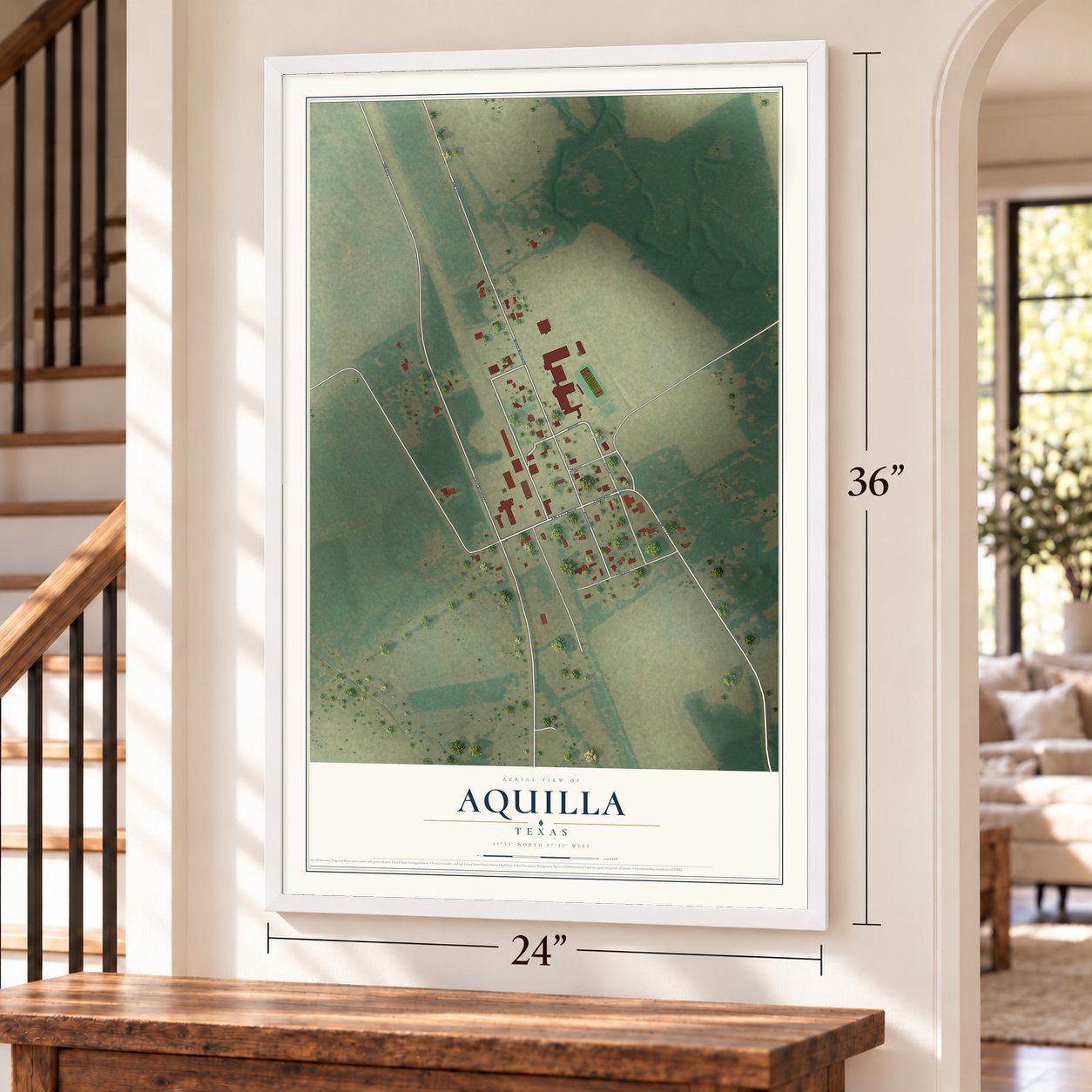 Aquilla, Texas map, 24 x 36 inch print in a white frame by a staircase