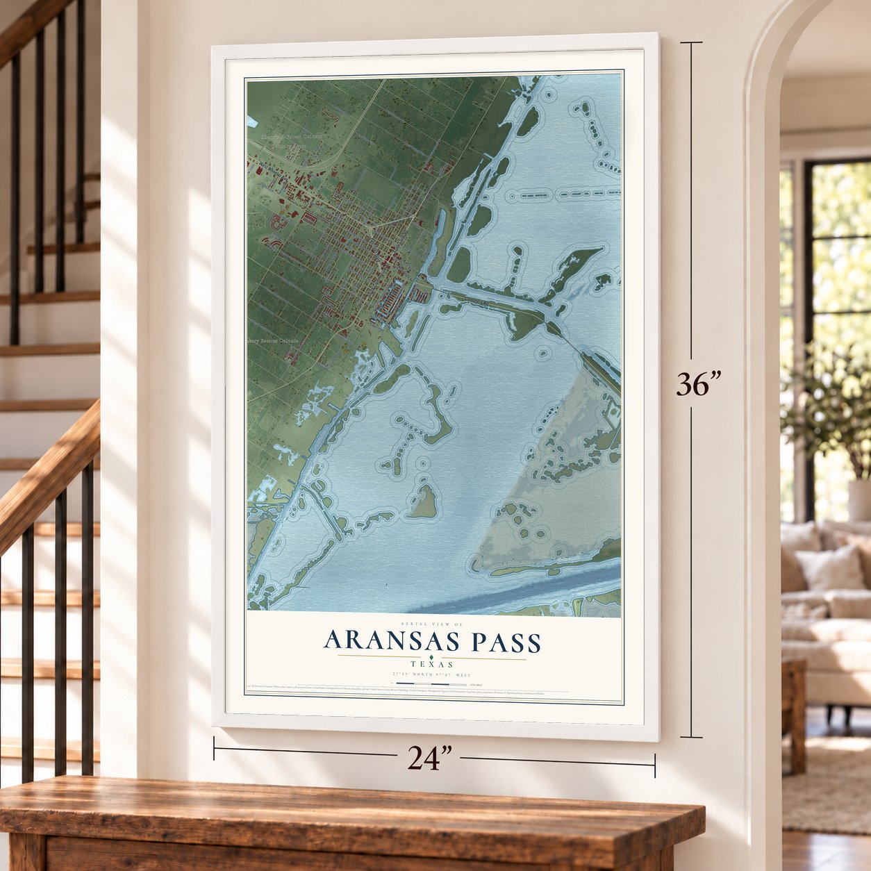 Aransas Pass, Texas map, 24 x 36 inch print in a white frame by a staircase